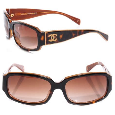 chanel tortoise shell glasses with chanel written on frame|Chanel sunglasses price.